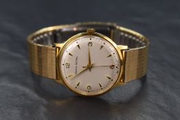 A gent's vintage Smiths Astral manual wrist watch having Arabic quarter numerals and baton dial with