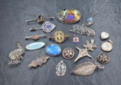 A small selection of white metal and HM silver jewellery including butterfly wing brooches and