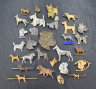 A selection of dog related brooches of various breeds