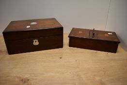 A Victorian mahogany sewing box, having a vacant Mother of Pearl cartouche to the lid and opening