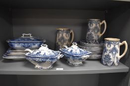 A selection of 19th/20th Century blue and white ironstone tableware, including lidded soup