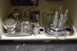 An assorted selection of silver plated ware, to include engraved trays, cruet stand, and rose bowl