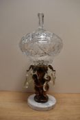 An early 20th century pressed glass, cast metal and variegated white marble centre-piece, the