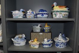 An assorted collection of 19th and 20th Century lidded tureens and hens on nests, to include a