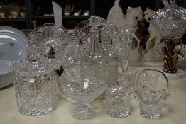 A selection of cut glass items comprising fruit bowl, biscuit barrel and decanters etc.