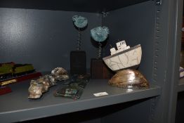 A selection of contemporary decorative ornaments and decor, to include a novelty boat ornament and