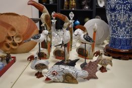 A selection of 20th Century soft wood painted bird studies, to include toucans and pelicans of