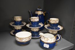 An early 20th Century Copeland Spode Regent patterned coffee set, comprising lidded coffee pot,