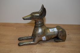 A white metal study of Anubis, measuring 24cm long