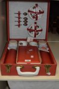 A mid-20th Century Sirram branded picnic set, comprising two flasks, lunch box, two teacups,
