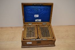 A 20th Century games set in metal bound hardwood box, comprising two hardwood score boards and packs