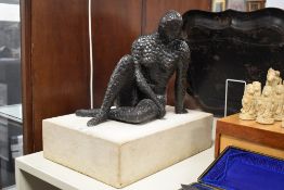 After Henry Spencer Moore OM CH FBA (British 1898 - 1986) A 20th Century cold cast bronze study of a