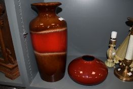 A 1970s West German pottery vase, 202-43, having a red banded design and measuring 44cm high, and