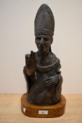 A 20th Century sculpture bust, depicting a papal figure, raised on an oval pine plinth, altogether