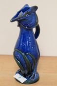 C.H. Brannam, an art pottery jug modelled as a grotesque bird and covered in a blue/green glaze,