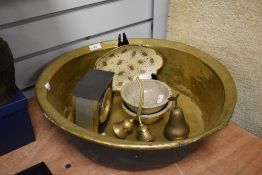 A large 19th Century brass coloured cream pan, measuring 48cm in diameter, and other metal ware