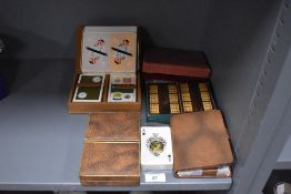 A selection of 20th Century games, to include cards and bezique
