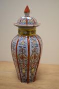 A 19th Century Chinese vase and cover, decorated in polychrome with red, yellow, and green,