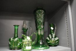 A 19th/20th Century green overlaid flash glass vase of tapering form, measuring 38cm high, and a