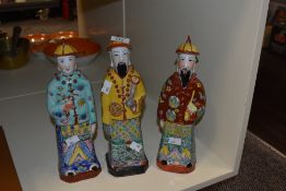 Three vintage oriental porcelain figures, all measure 29cm tall.