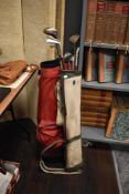 A bag of mid-20th Century golf clubs, by John Shiells of Kendal and others, and a separate golf bag