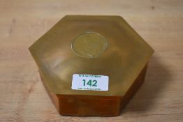 A 20th Century hexagonal lidded copper trinket box of Arts and Crafts style, the lid inset with a