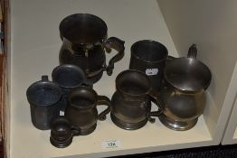 A late 20th Century silver plated presentation tankard with engraved inscription, together with a