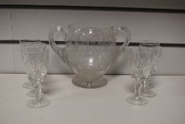 A 19th century wheel engraved and cut glass two handled vase, engraved with foliate bouquet and