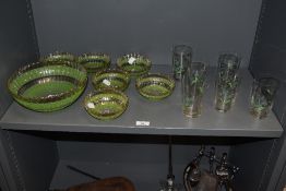 A mid-20th Century textured glass trifle set, having a green banded design and gilt accents,