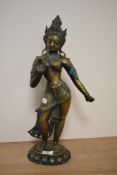 An early 20th Century Indian brass statue depicting the Goddess Tara Parvati, having intricately