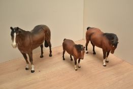 A Beswick pottery thoroughbred stallion, 1772, in brown designed by Arthur Gredington 20cm repair to