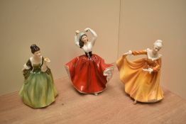 Three Royal Doulton bone china figurines comprising 'Karen' HN 2388, 'Kirsty' HN 2381 and 'Fluer' HN