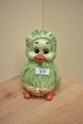A 1983 Keith Harris Orville ceramic money bank, impressed marks to base and retaining plastic