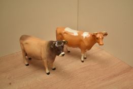 A Beswick Pottery Jersey Bull number 1422 in light brown with shading and darker head sold