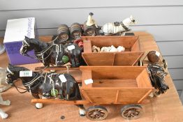Three Melba Ware shire horse and cart studies sold alongside a similar horse and cart labelled