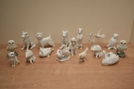 A collection of small Kaiser bisque porcelain animal and bird studies, various including owls, dogs,