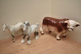 A Beswick Pottery Cantering Shire Horse in grey gloss, number 975, sold together with a Bois Roussel