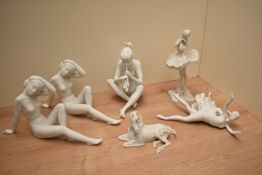 A collection of Kaiser bisque porcelain figurines comprising two nude ladies seated, a seated nude