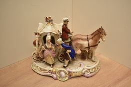 A vintage German porcelain figurine of a horse and carriage, having stamp to base.