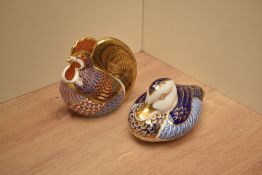 Two Royal Crown Derby bone china paperweights Rooster and Duck both having silver coloured stopper
