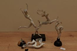 A group of unusual mid-20th century mottled glass figures by Istvan Komaromy, comprising a naked fem