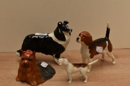A small collection of Beswick Pottery dog studies, comprising Sheepdog (large) number 1792 in