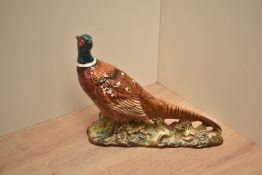 Beswick Pottery Pheasant in red-brown and teal green designed by Arthur Gredington model number