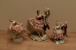 Two 20th century West German Alka Kunst (Dresden) porcelain 'Crinoline' dancer figure groups and one