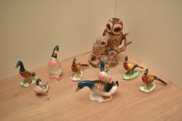 Border Fine Arts 'Tawny Owl and Owlet' studies number 039 alongside a group of three Beswick Pottery