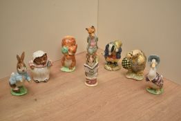 A group of nine Beswick Beatrix Potter figures, to include Peter Rabbit, Mr Alderman Ptolemy, Foxy
