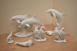 A collection of Kaiser bisque porcelain, marine themed animal and bird figures, comprising two large
