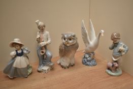 Four Nao by Lladro figurines comprising 'Short Eared Owl' number 712, 'Someone is Calling You'