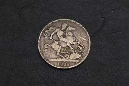 A 1822 George III Silver Crown, TERTIO on edge
