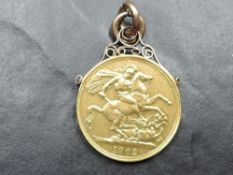 A 1902 Edward VII Gold Double Sovereign, Royal Mint having 9ct Gold Mount attached